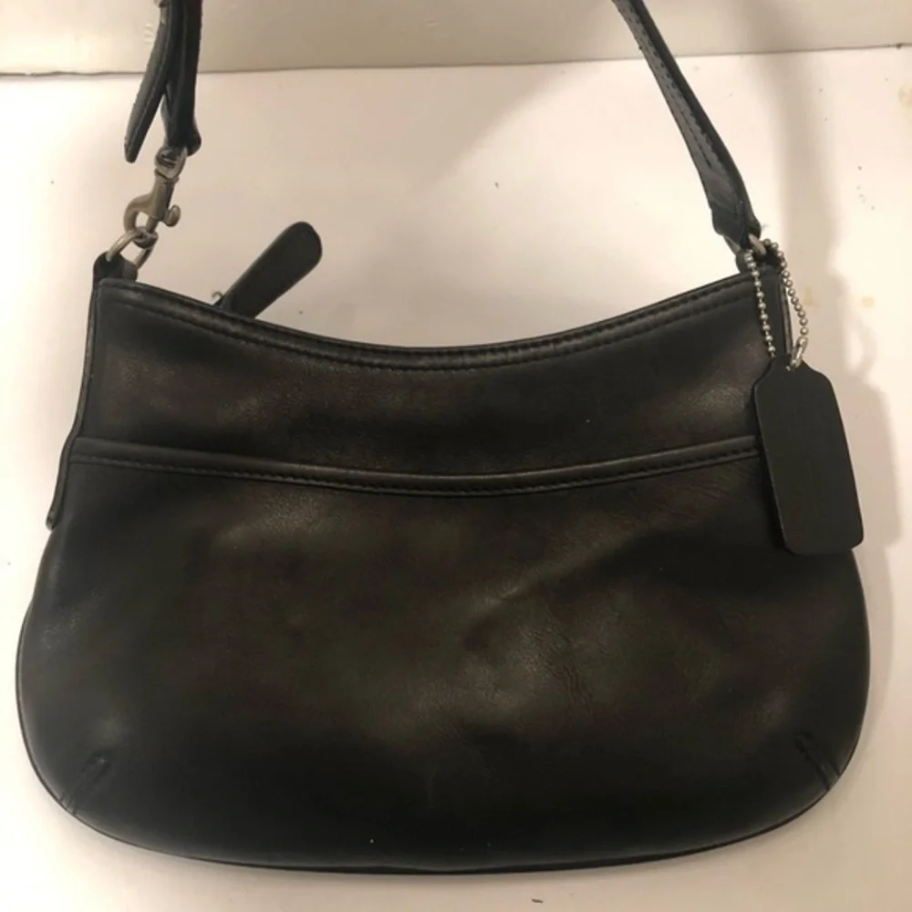 Coach almost vintage black leather mini bag